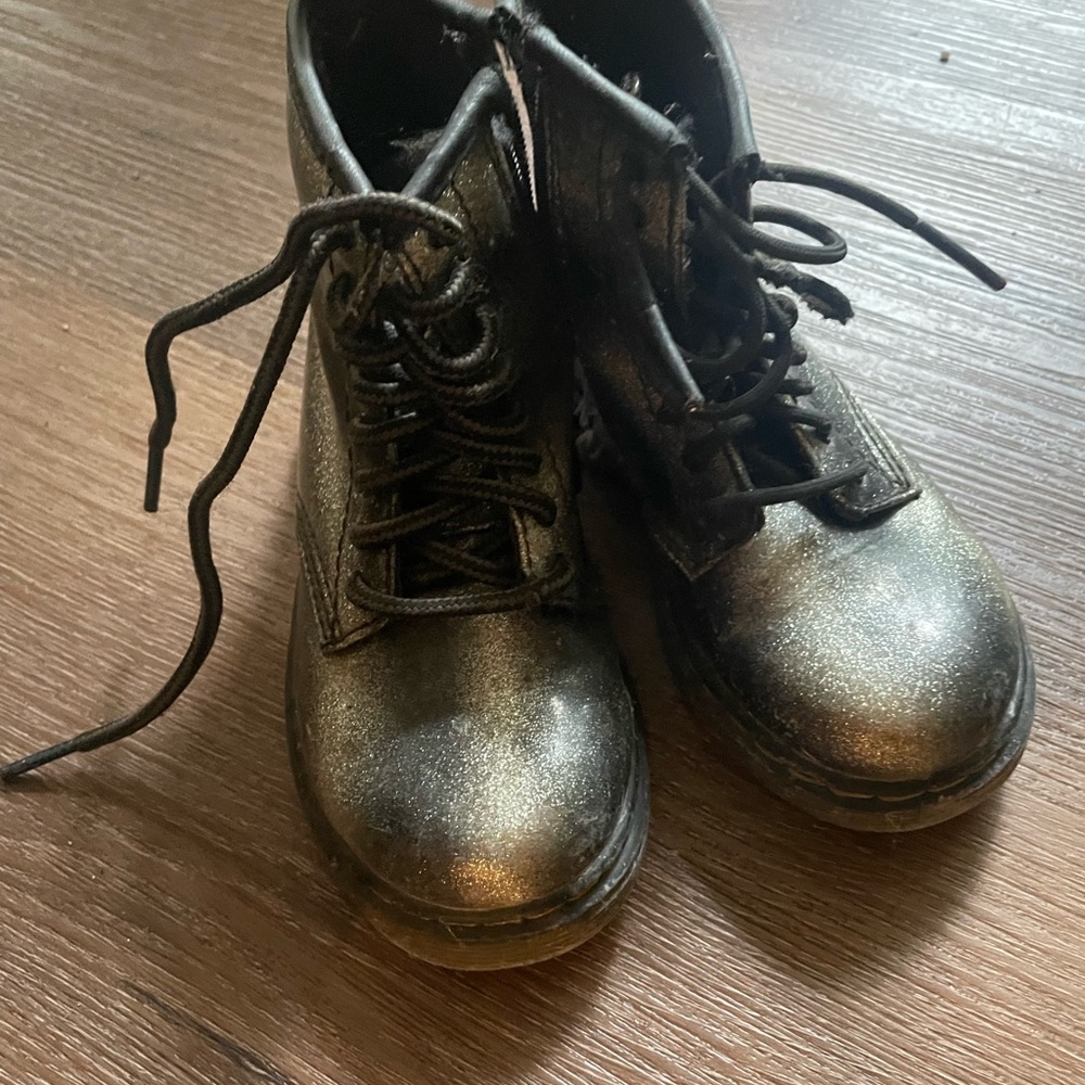 Dr. Martens Black Boots with Metallic Toe Cap and Sturdy Sole